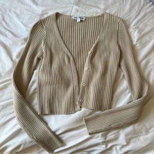 Light green button up sweater